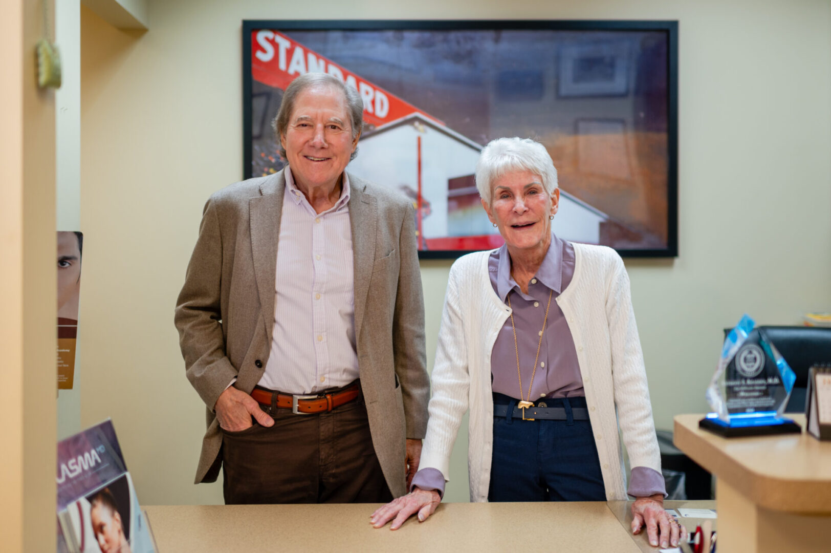 A man and woman standing next to each other.